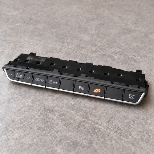 Audi B9 dashboard switch panel with illuminated PB Valves exhaust button