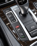 Close-up of BMW F10 integrated exhaust valve button