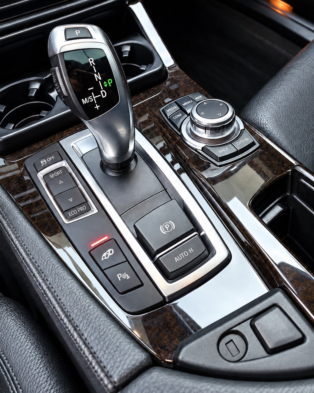PB Valves exhaust valve controller installed in BMW F10 centre console
